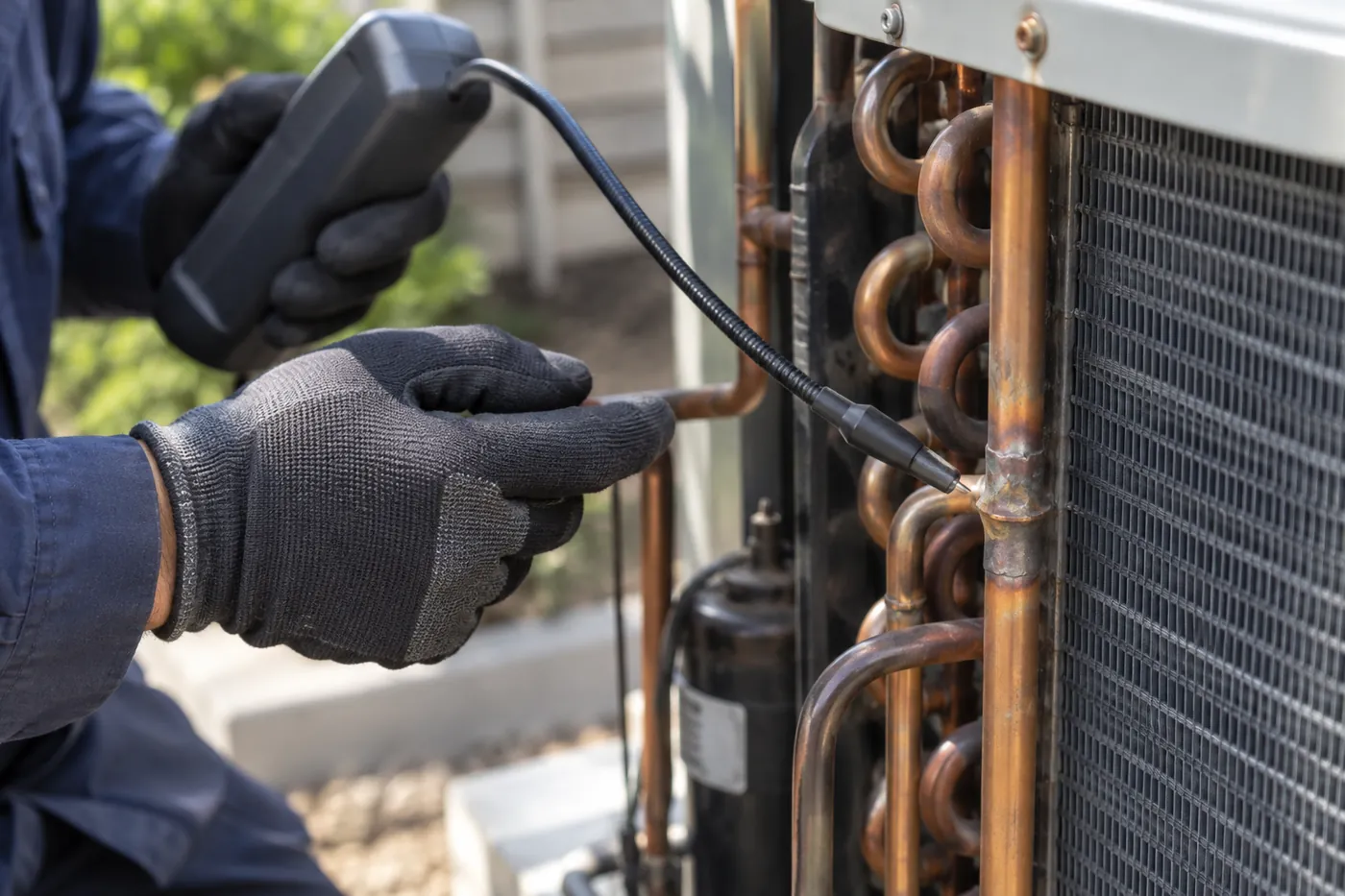 Using an electronic leak detector on AC refrigerant tubing