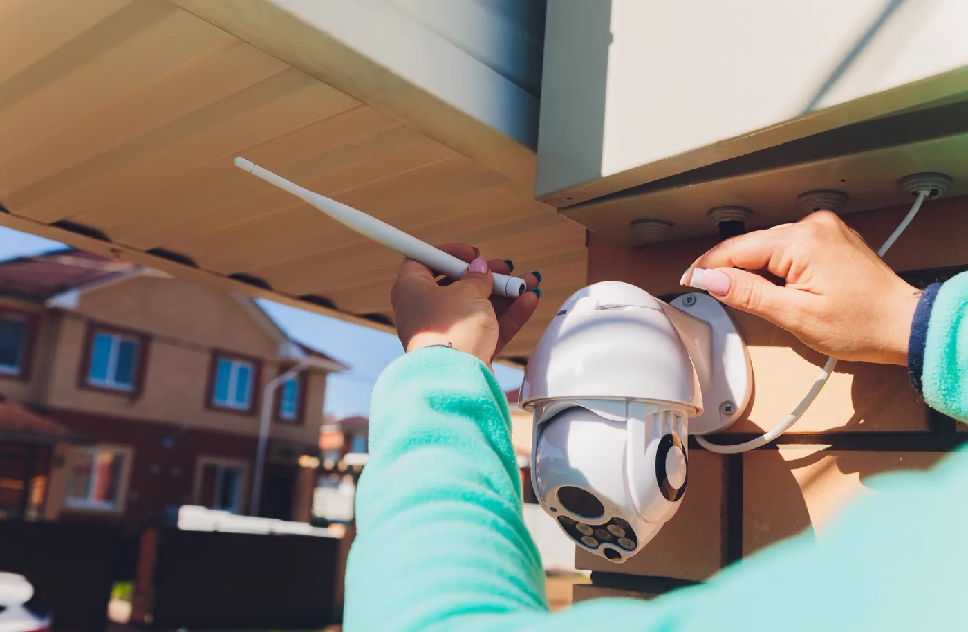 A security camera installed on the exterior of a home