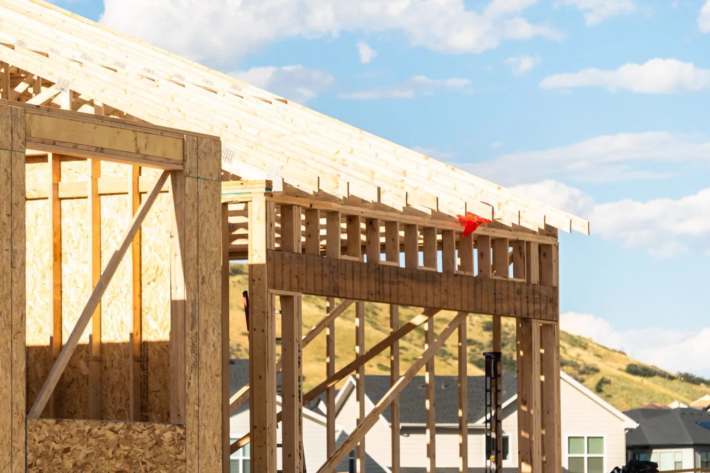 A new house under construction with wood framing