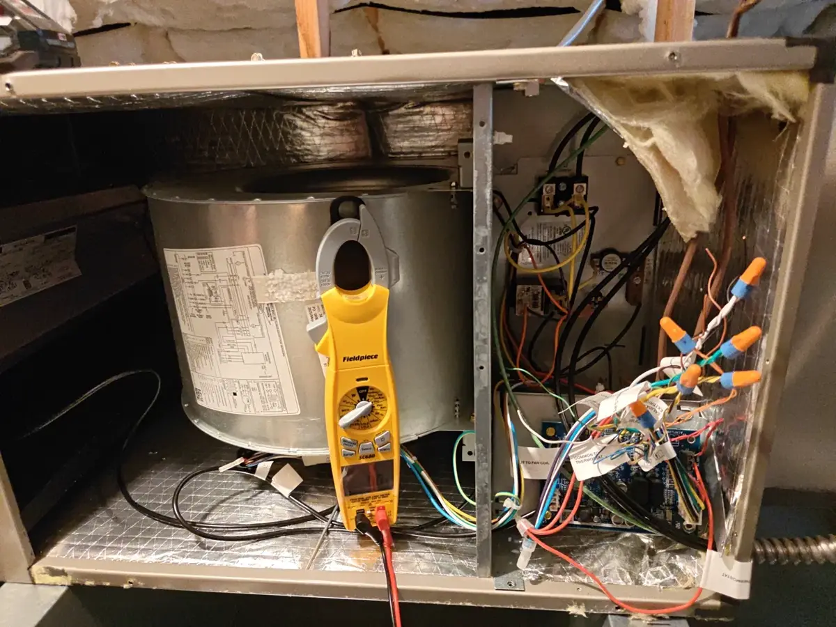 Diagnosing furnace control wiring with a clamp meter